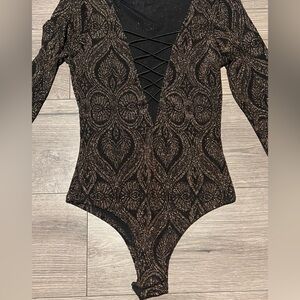 Long sleeve black and gold bodysuit Size S